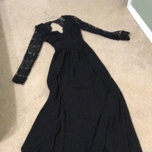 Black maxi dress with lace sleeves and open back
